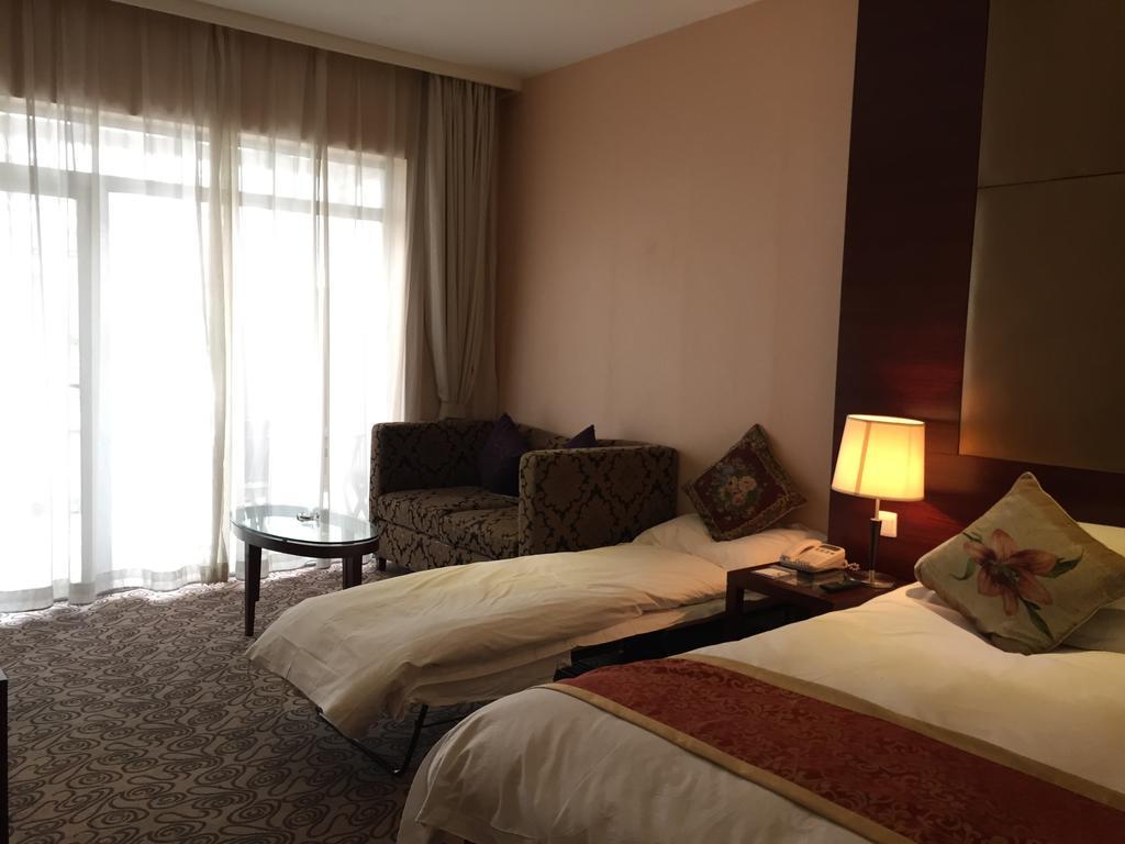 Shanghai Baron Business Bund Hotel Værelse billede