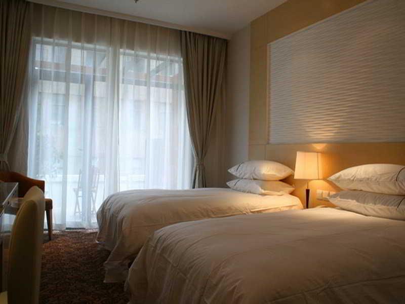 Shanghai Baron Business Bund Hotel Værelse billede